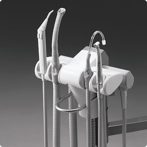 Instruments positioned on rack with aspirator